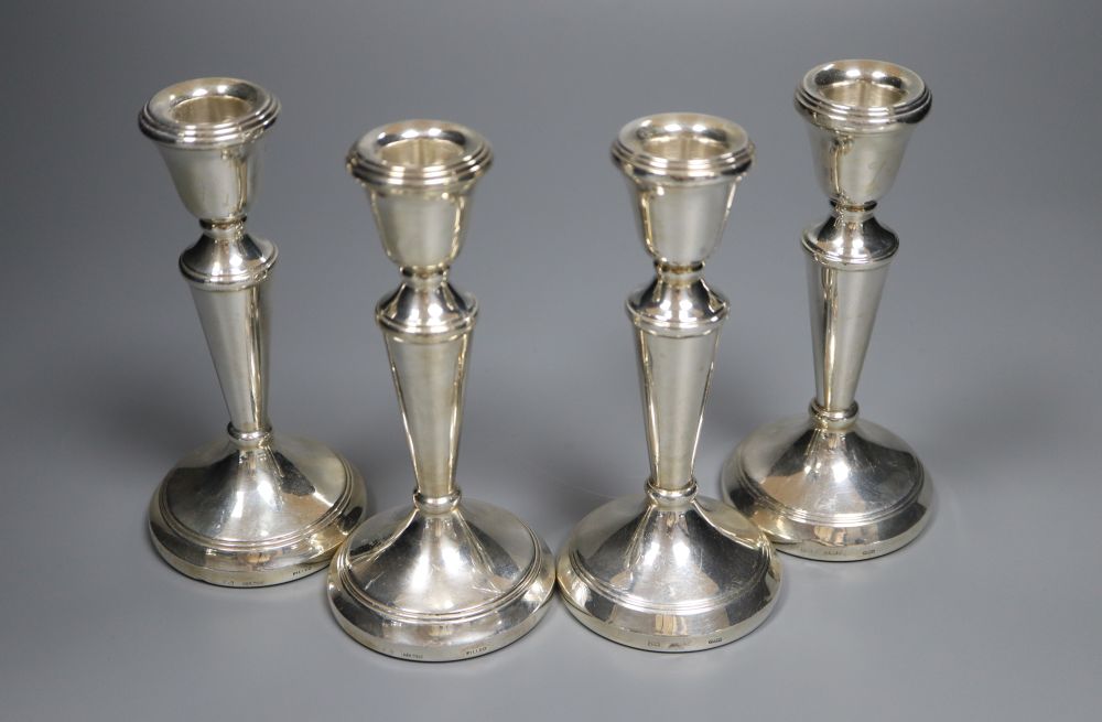 Two pairs of modern silver candlesticks, C. Ltd, Birmingham, 1985 and JM, Birmingham, 1989, 14.5cm, all weighted.